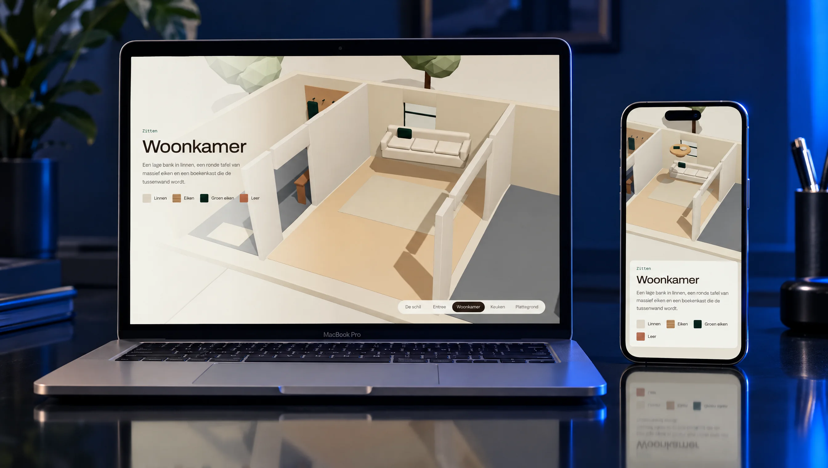 Laptop and phone showing Daalwerk: an isometric maquette of a living room with a sofa, round table and green wardrobe